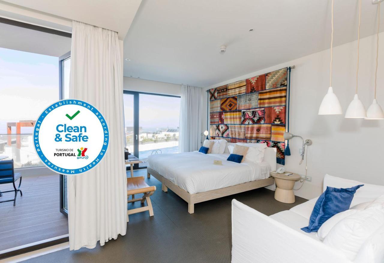 Royal Obidos Scenic Resort Praia del Rei Exterior photo Clean and Safe seal in a hotel room